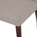 Silla de comedor Ikaro de deurope.com.mx, con diseño moderno y respaldo ergonómico en color gris claro.