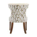 Sillón Tulip deoupe.com.mx en color blanco, con diseño moderno y patas de metal, asiento acolchado y respaldo curvado.