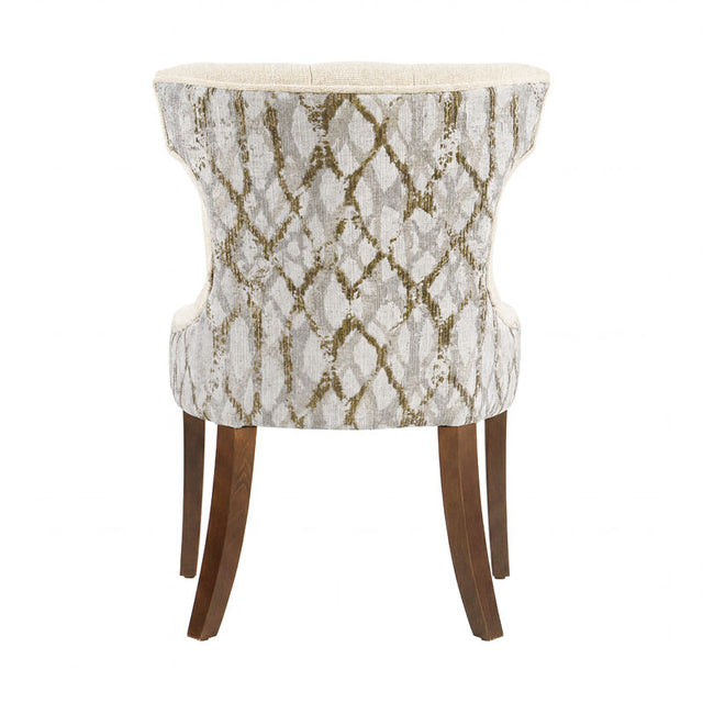Sillón Tulip deoupe.com.mx en color blanco, con diseño moderno y patas de metal, asiento acolchado y respaldo curvado.