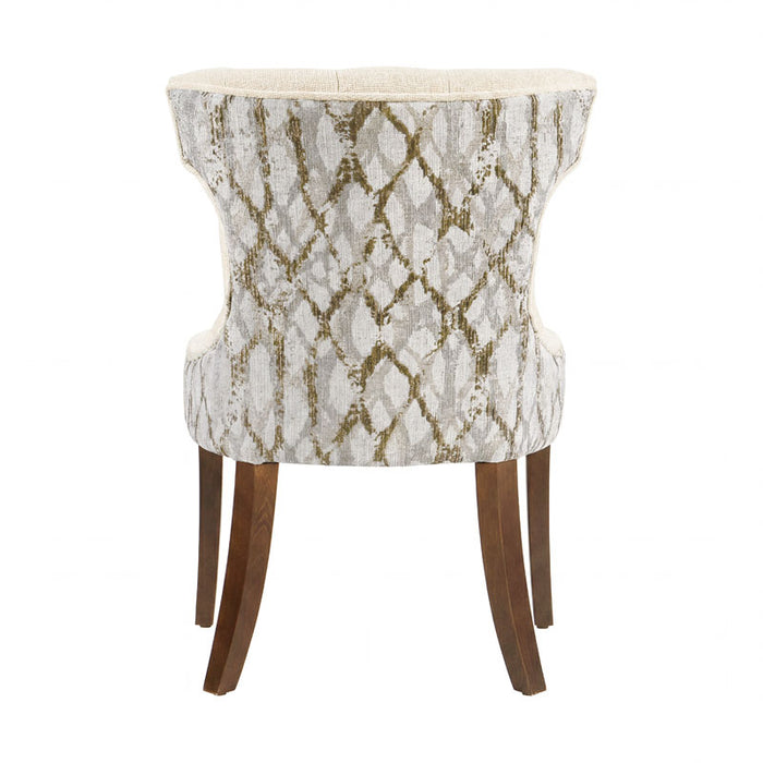 Sillón Tulip deoupe.com.mx en color blanco, con diseño moderno y patas de metal, asiento acolchado y respaldo curvado.