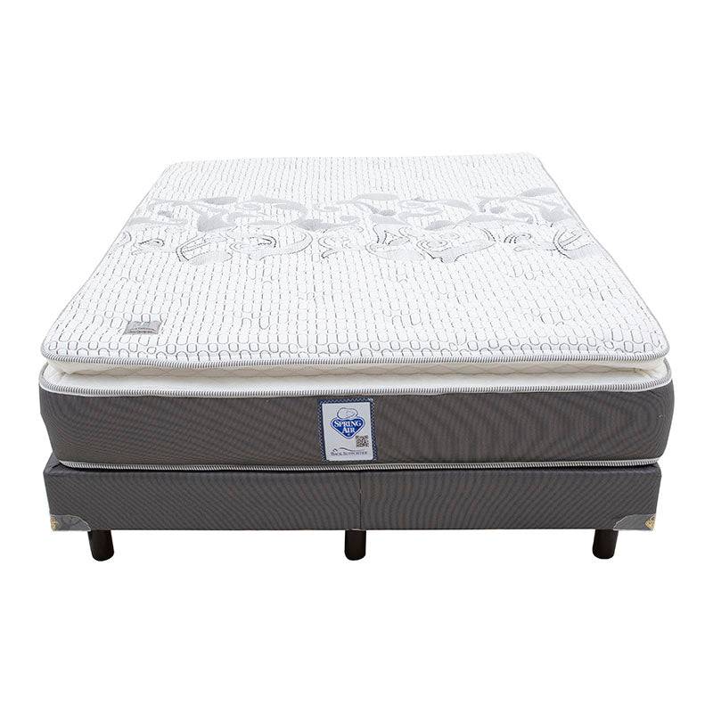 Colchón con box spring Air Lotus de tamaño Queen, con tejido de punto y espuma de alta densidad, en una habitación moderna.