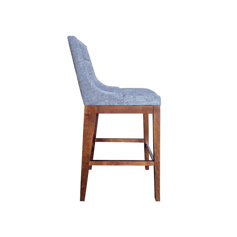 Banco para barra Bourbon de couleur gris, diseñado para uso en interiores, con estructura robusta y asiento cómodo.