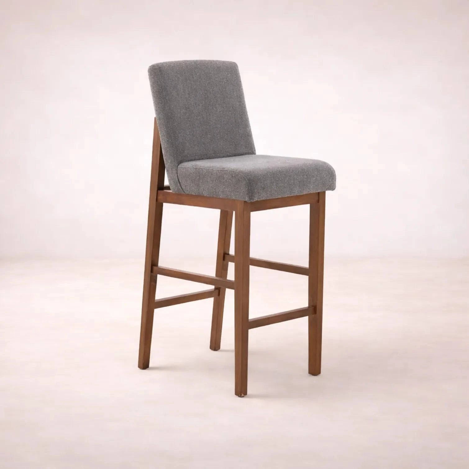 Banco Inglaterra de madera industrial con tapizado de tela, acabado en chapa de parota, frente de 42 cm, alto 111 cm, fondo 59 cm.