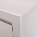 Buró Picasso de color gris claro, de madera industrializada, con superficie plana y patas cortas, diseño moderno y funcional.