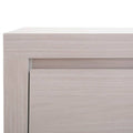 Buró Picasso decolor gris claro de madera industrializada, con superficie plana y diseño moderno, de aproximadamente 60 cm de ancho.