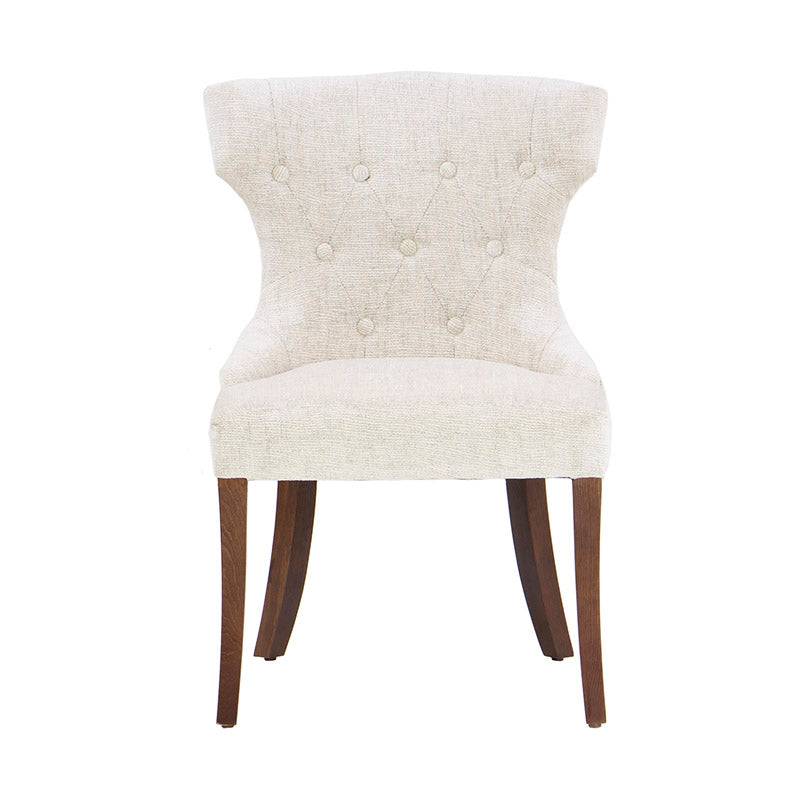 Sillón Tulip de color nogal en imagen, con diseño elegante y moderno, ideal para comedor o sala de estar.