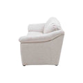Sofá loveseat Chloe deoupe, tapizado en tela marfil, con diseño moderno y tamaño compacto para sala o estudio.