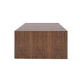 Mesa de centro Berne Made de madera de nogal, con superficie rectangular y patas robustas, en acabado de chapa de nogal.