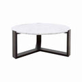 Mesa de centro Plati de Deurope.com.mx con estructura en wengué, tapa de mármol veneciano, diámetro 100 cm y altura 45 cm.