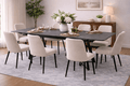 Mesa de comedor extensible Yad de color gris oscuro con superficie de cerámica y base metálica, vista frontal.