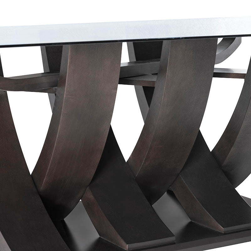 Mesa de comedor Burj de cristal y madera Nogal, con superficie de cristal y estructura de madera en un ambiente moderno.