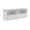 Mueble para TV Eros dechapado en encino y laca blanca, 140 cm de ancho, con espacio para dispositivos y estilo moderno.