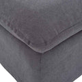 Otomán Calm de Deurope en tela gris oscuro, tapizado plano con fibra, dimensiones 130x67x47 cm, vista frontal.