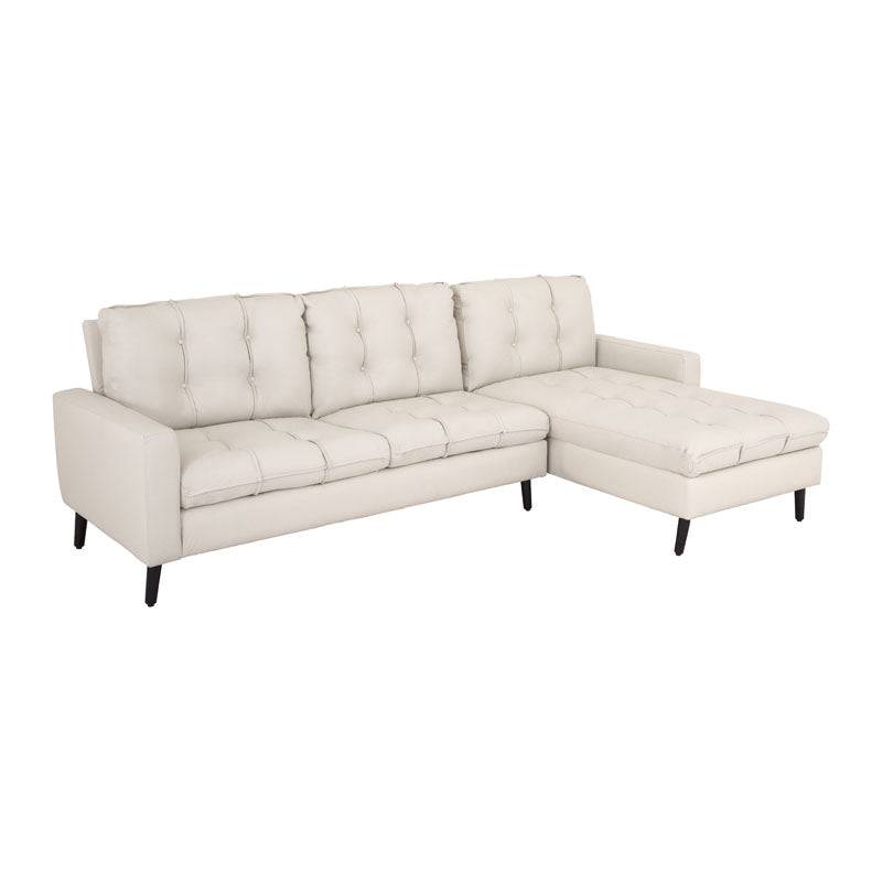 Sala Eugenia de piel con chaise en color crema, mobiliario elegante y cómodo para sala de estar.