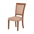 Silla Siena del juego de comedor deurope.com.mx en madera de banak y encino con tapiz de cuero en color almendra, frente y altura visible.