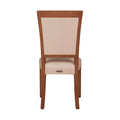 Juego de comedor Siena con sillas de madera en tono café almendra y tapizado de cuero, de deurope.com.mx.