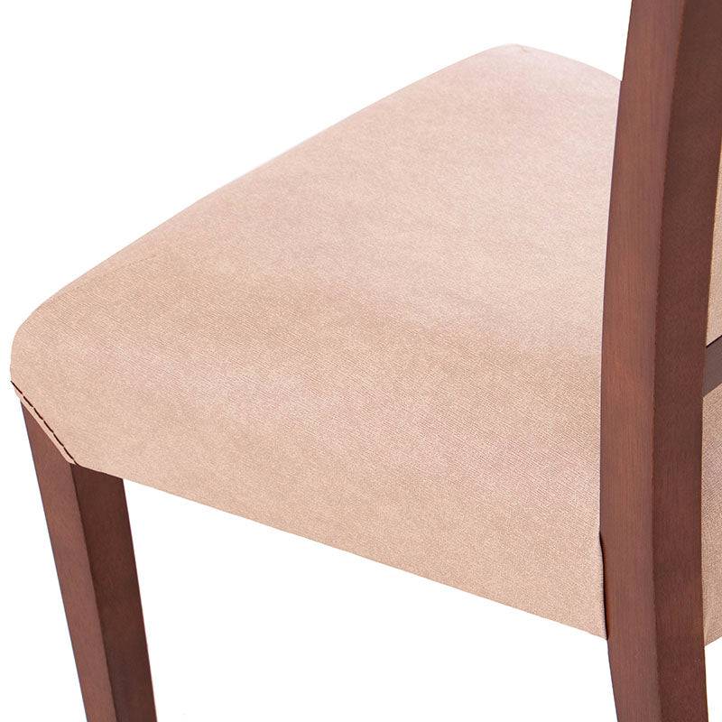 Silla de comedor Siena de Madera de Banak y tapiz leather touch en color café almendra, con respaldo y asiento acolchado.