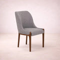 Juego de comedor Quetzal de 7 piezas, incluyendo sillas y mesa, en estilo moderno y elegante, en color natural y madera.