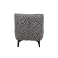 Sillón Andrea Essa de tapiz negro con estructura moderna, frente de 75 cm, altura de 86 cm y fondo de 85 cm en habitación elegante.