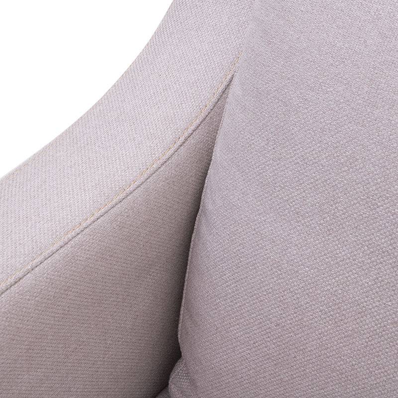 Sofá Michelle de color beige de tela con textura afelpada, ideal para salas modernas y confortables.