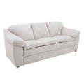 Sofá Chloe de color marfil en tela Money Snow, con estructura moderna y asiento amplio, en una sala de estilo contemporáneo.