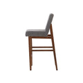 Banco Inglaterra de madera con estructura de chapa de parota y tapizado de tela, en estilo industrial, mide 42x111x59 cm.