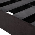 Base de cama Lazy de color negro con estructura de madera de pino y tapiz de tela, de aproximadamente 190 cm de largo.