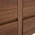 Cómoda Carolina de madera industrializada en nogal, con 4 cajones y diseño moderno, frente de 140 cm, altura de 70 cm y fondo de 37 cm