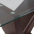 Conjunto de comedor Aragón de 8 piezas de madera Nogal con cubierta de cristal y estructura moderna en color oscuro.