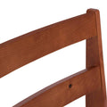 Silla para escritorio Texas de madera industrializada en color nogal, vista frontal, con medidas de 55x87x48 cm.