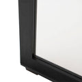 Espejo de pie negro Lazy con estructura de melamina, 180 cm de alto, 60 cm de ancho y fondo de 40 cm, en interior moderno.