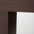 Espejo Boston de madera oscura con marco industrial, tamaño 80x110 cm, reflejo en superficie lisa y elegante diseño.
