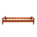 Cama Baja Texas de madera de pino con acabado en nogal, diseño industrial y estructura resistente, vista frontal.