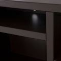 Mueble para TV Asturias de deurope.com.mx en madera industrializada moka, con espacio para televisor y almacenamiento.