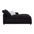 Módulo de sala Lazy Chaise de color negro, estructura de tela tejida, con respaldo y asiento amplio en ambiente moderno.