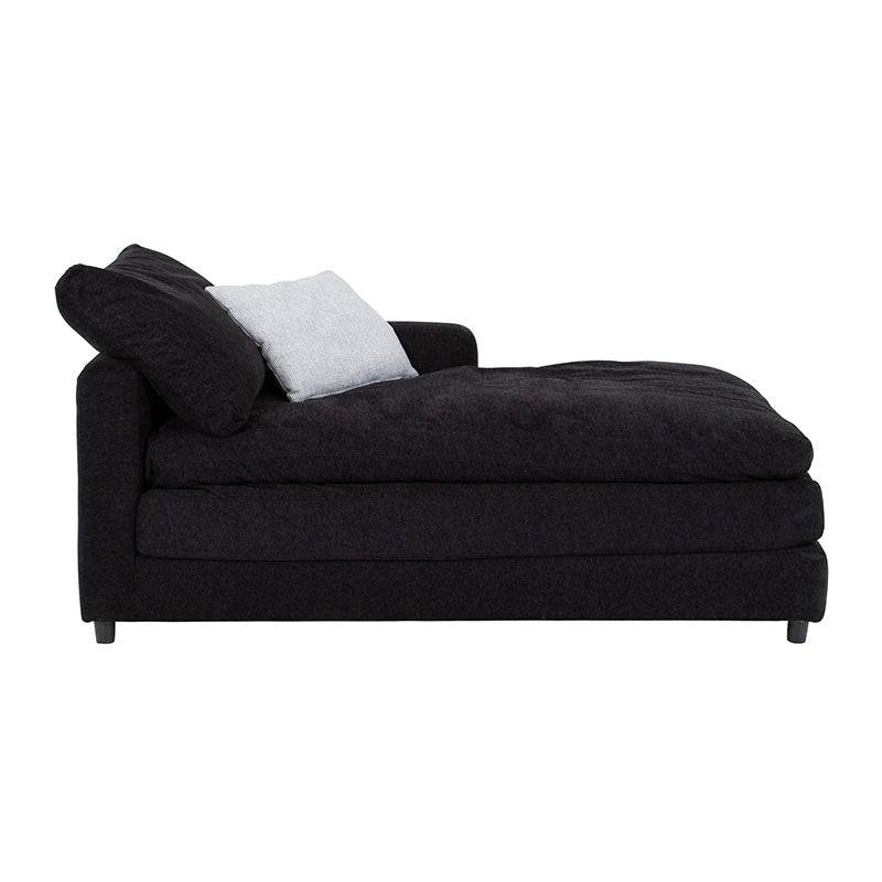 Módulo de sala Lazy Chaise de color negro, estructura de tela tejida, con respaldo y asiento amplio en ambiente moderno.
